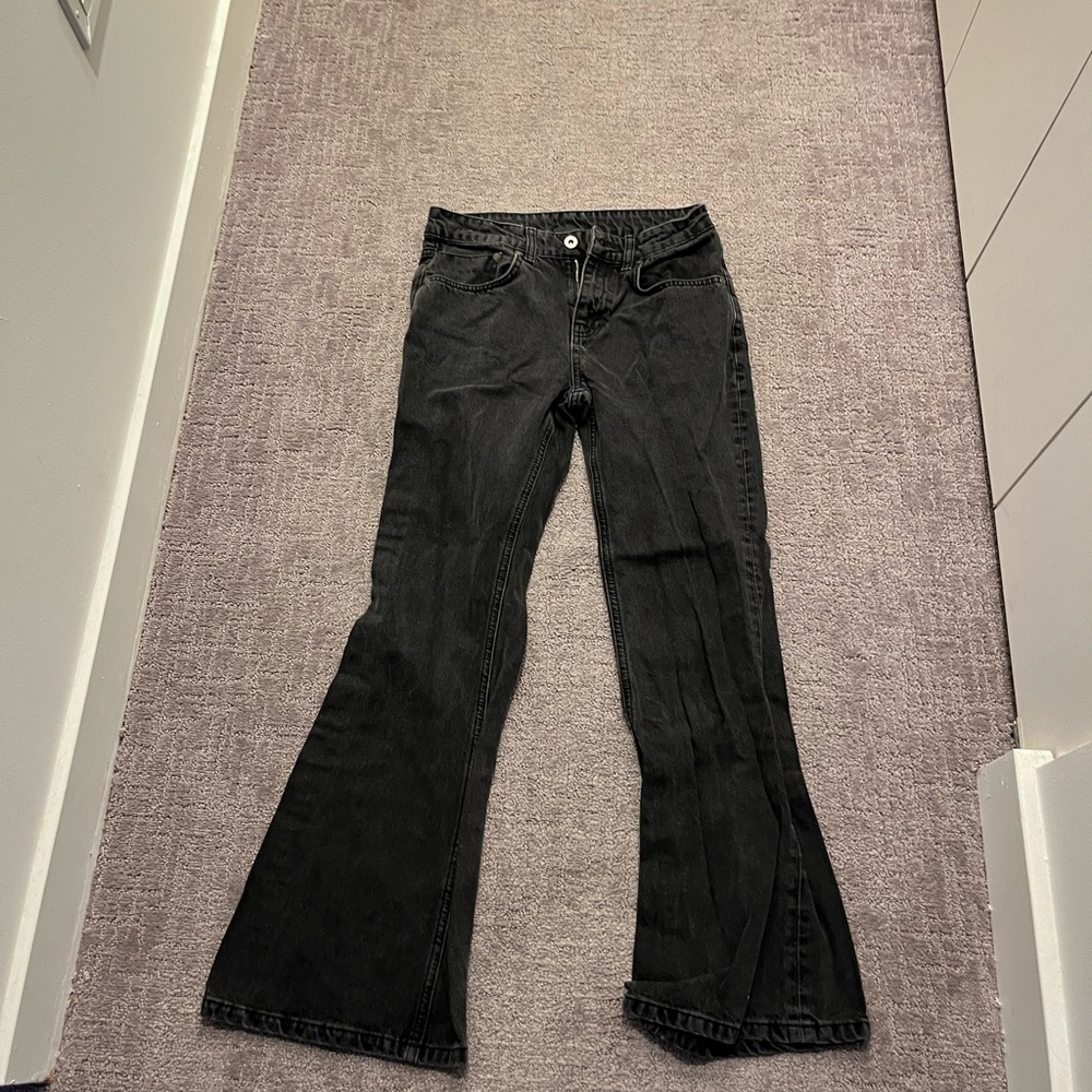 Ragged boot cut low rise black jeans